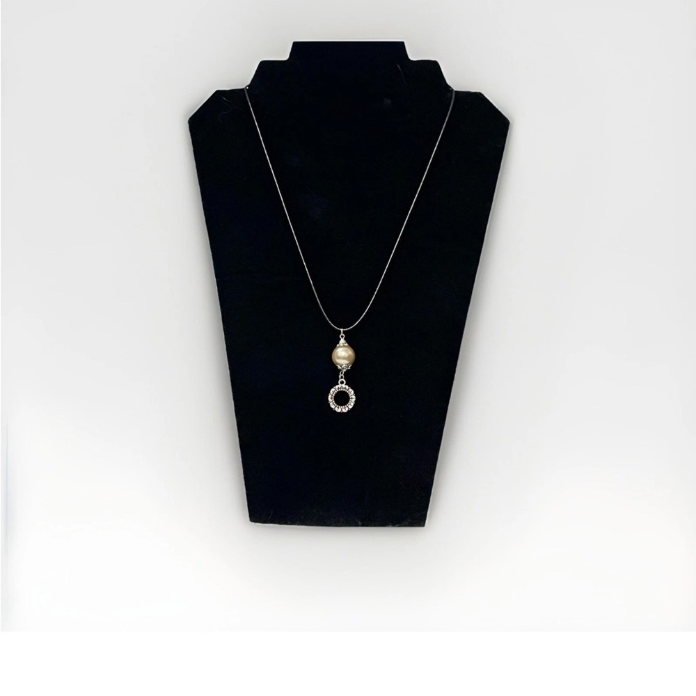 Silver pendant with pearl beaded details on leather cord #glamour